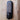 Gatemaster SLDS Superlatch Surface Mounted Code Latch Lock in black, mounted on a light brown wooden surface, and a black oval handle at the bottom.